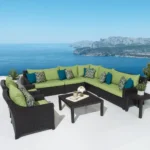 Waterproof rattan outdoor 9-seater sectional sofa set with green cushions and dark brown frame, including side and center tables