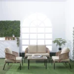 Beige and cream all-weather patio rope sofa set with glass top coffee table on outdoor deck