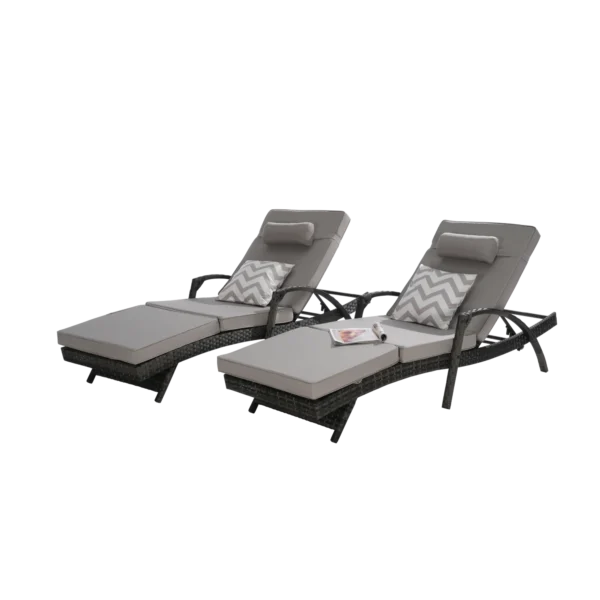 Set of 2 long reclining outdoor wicker chaise lounge chairs with cushions, perfect for patio or garden.