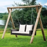 Double seater hanging swing in dark brown, designed for balcony or garden use, without stand.