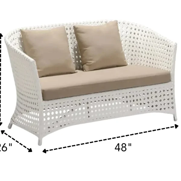Outdoor 4-seater sofa set with white and beige cushions, placed in a garden setting for relaxation.