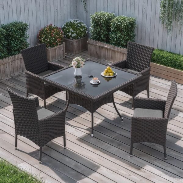 5-piece outdoor rattan dining set with grey cushions and dark brown armchairs, perfect for patio or garden