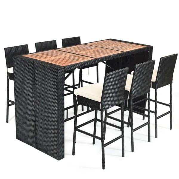 7-piece outdoor rattan bar set in black and off-white with high stools, table, and cushions, perfect for garden or patio settings.