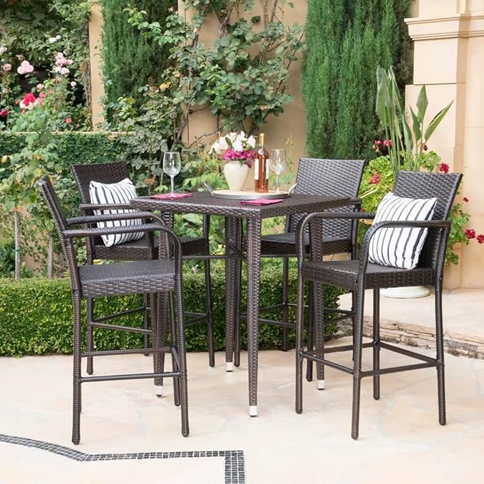 5-piece outdoor wicker bar set with stools and table, ideal for backyard and poolside gatherings.