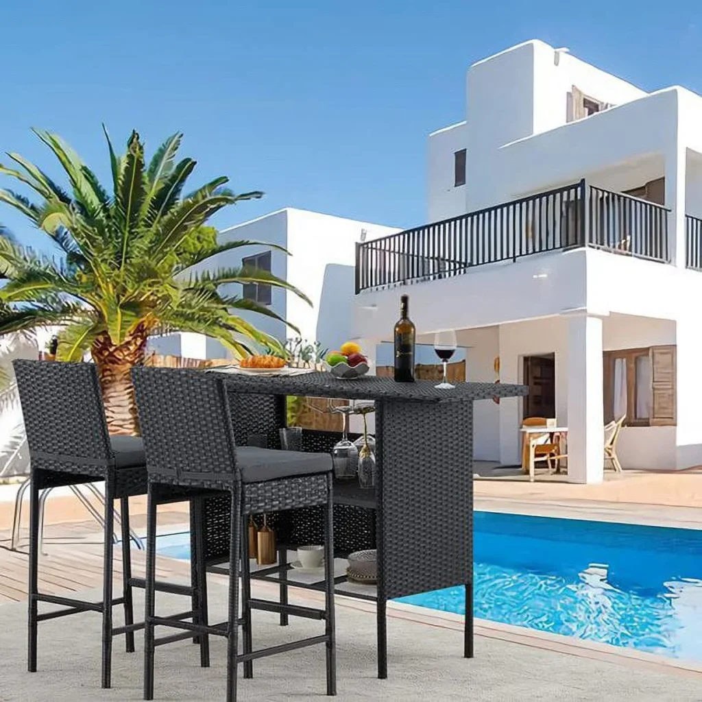 Enjoy stylish outdoor dining with this sleek 3-piece rattan bar table and chair set, complete with comfortable removable cushions.