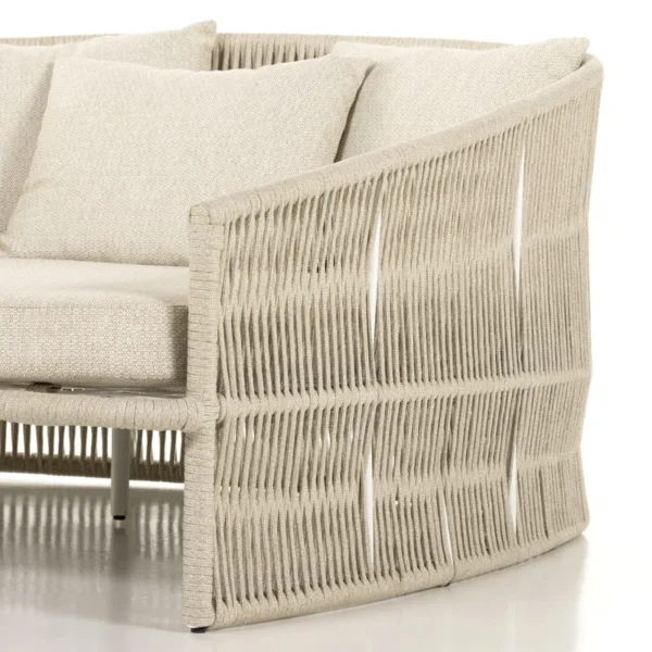 Beige outdoor rope daybed with rattan design, perfect for garden, terrace, balcony, or poolside relaxation.