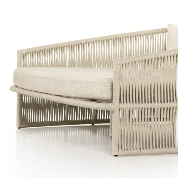 Beige outdoor rope daybed with rattan design, perfect for garden, terrace, balcony, or poolside relaxation.