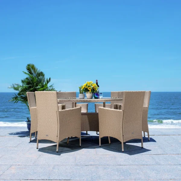 6-person round outdoor dining set with beige cushions on a patio