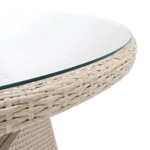 6-person round outdoor dining set with beige cushions on a patio