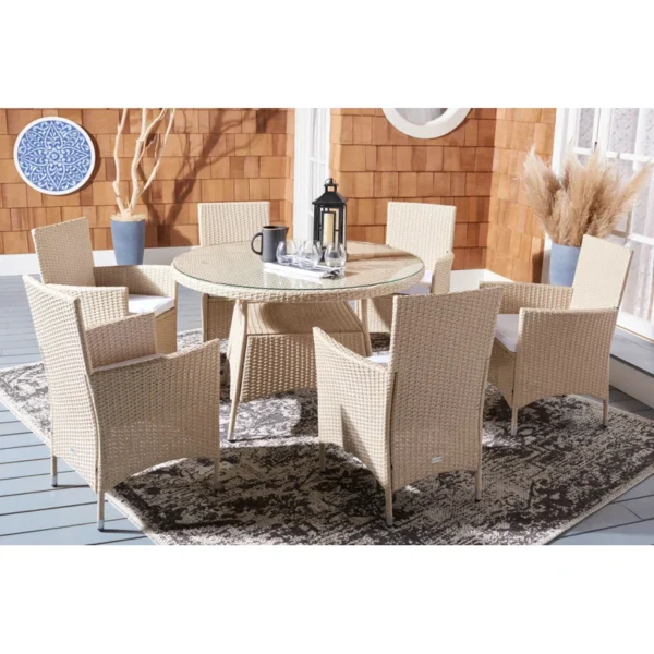 6-person round outdoor dining set with beige cushions on a patio