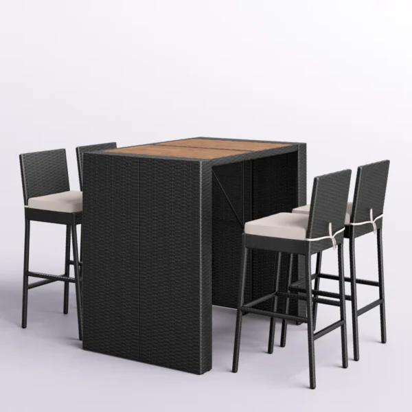 5 piece outdoor patio rattan bar set in black and white with high chairs and a bar table arranged on a garden patio.