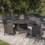 4-Person round outdoor dining set with cushioned chairs, ideal for garden, patio, or balcony