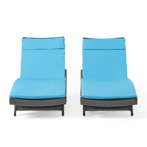 Set of 2 outdoor patio recliner lounger chairs in dark brown frame with sky blue all-weather cushions.