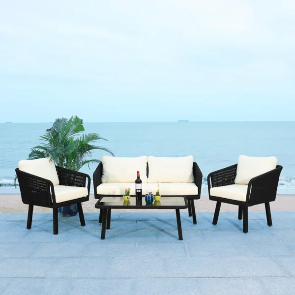 Black and white outdoor rope sofa set with matching center table, perfect for garden or patio