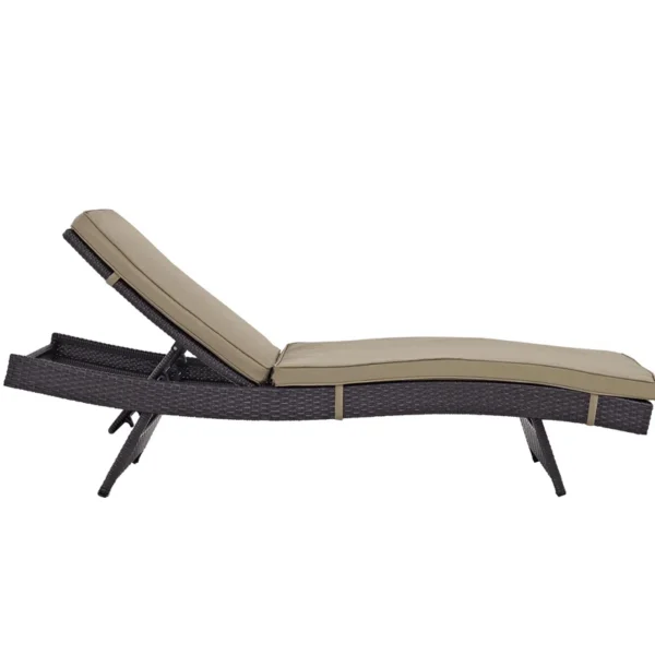 Beige wicker rattan outdoor patio chaise lounge chair with cushioned seat.
