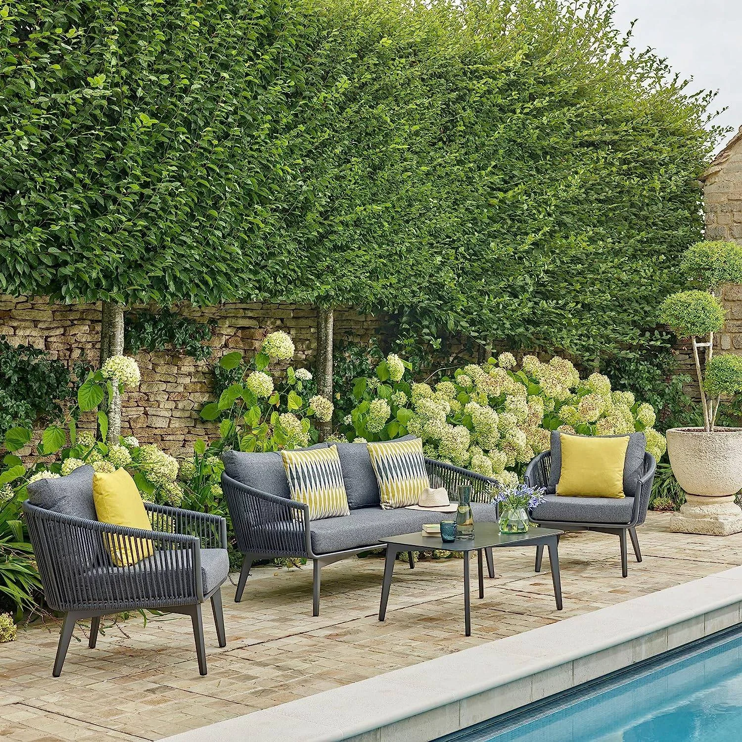 Grey outdoor rope sofa set with matching table, modern patio furniture for garden or terrace