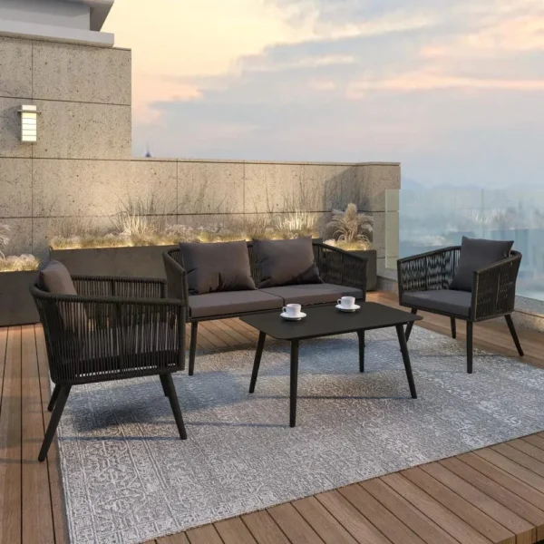 A set of 4 sofa chairs in black and dark grey upholstery, arranged in a stylish living room setup.
