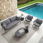 Outdoor grey rope 4-seater bistro set with a table and chairs on a patio