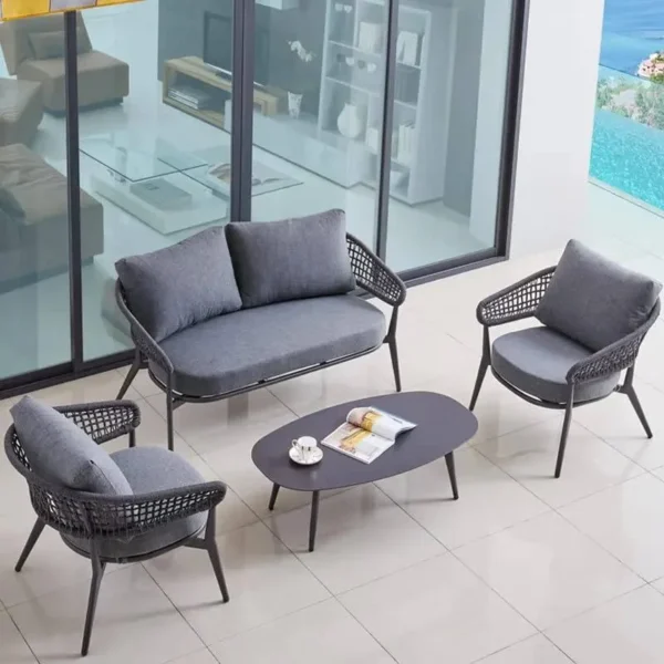 Outdoor grey rope 4-seater bistro set with a table and chairs on a patio