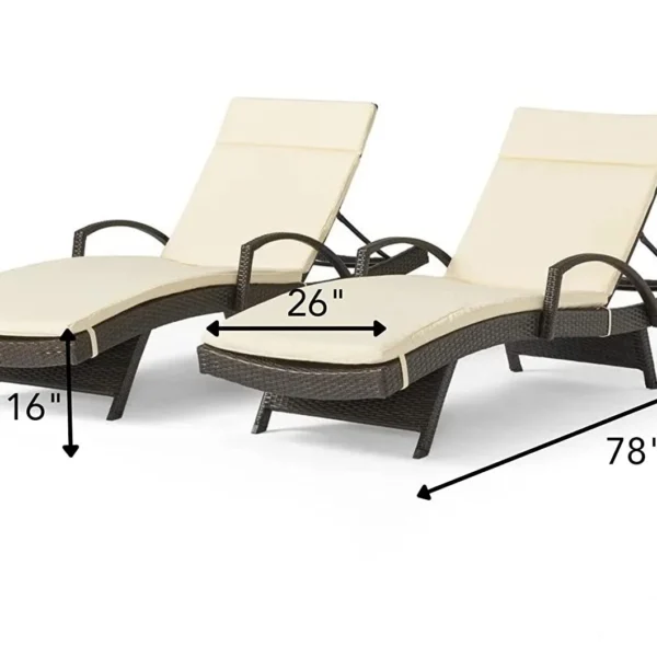 Dark brown rattan sun lounger set with cream cushions and adjustable backrests for patio, lawn, or beach.