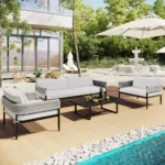 4 seater outdoor conversation sofa set with grey and white rope design, soft cushions, and matching center table.