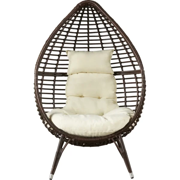 Brown single seater swing basket hanging in balcony with cushions.