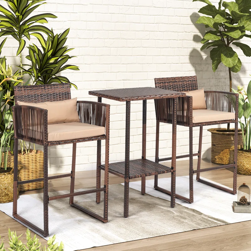 Patio 3-piece bar set with dark brown frame and cream cushions, including a high table and two tall stools, suitable for outdoor and indoor use.