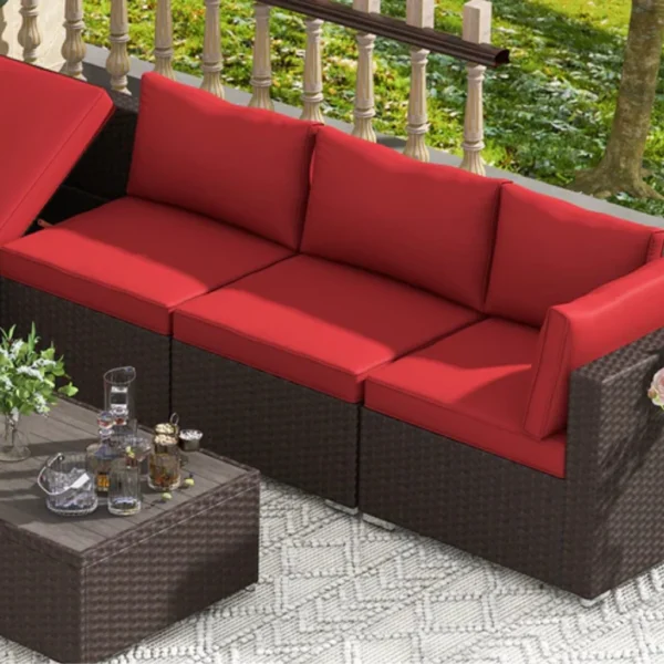 6 seater outdoor rattan wicker sofa set with red cushions and brown center table for patio or garden