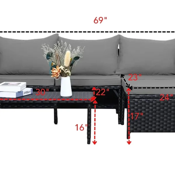 Outdoor sofa set with cushioned seats on a garden patio, weather-resistant wicker frame, and stylish modern design.