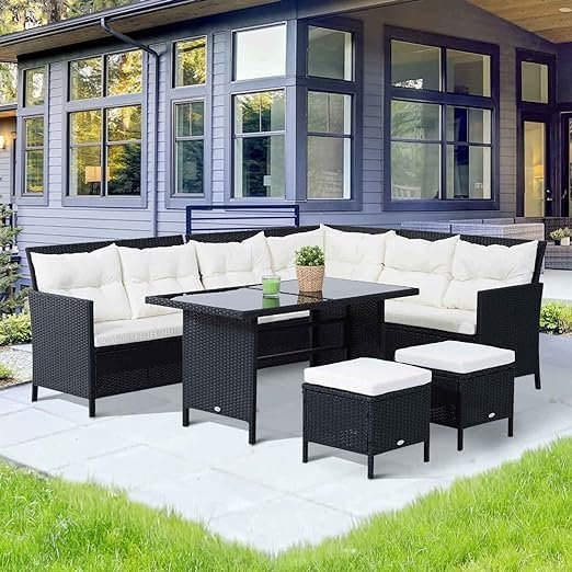 7-seater outdoor wicker sofa dining set with cushioned seats and durable glass-top table for patio or garden"