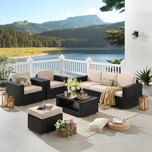 "5-piece outdoor seating set in brown rattan wicker with cream cushions, including a spacious seater and matching chairs, ideal for patio or garden lounging."