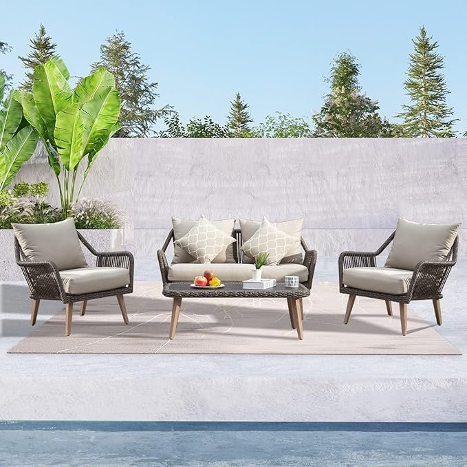 Outdoor rope sofa set with cushioned seating in modern patio setting