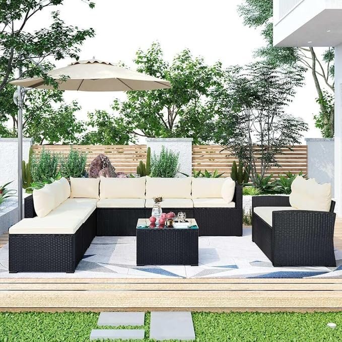 "9-seater outdoor wicker rattan sectional couch with armless chairs and glass-top center table, perfect for patio and garden seating."