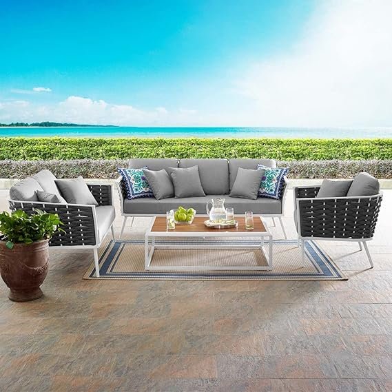 Outdoor rope sofa set with cushioned seating in modern patio setting