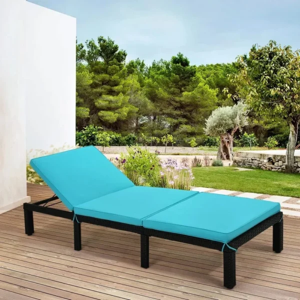 Double chaise lounge with waterproof cushions, designed for outdoor relaxation.