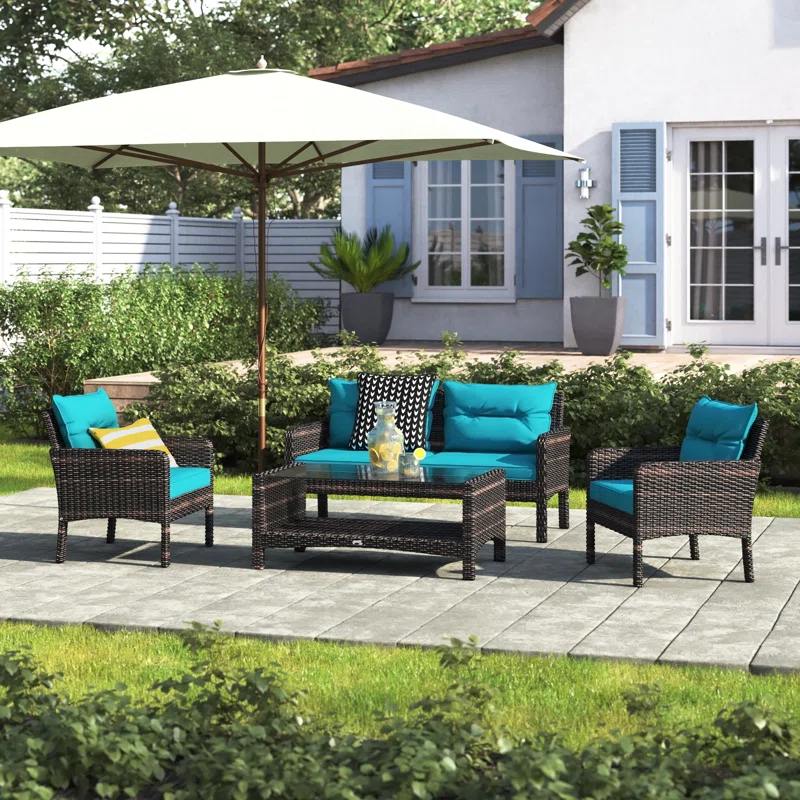 4-Piece Sectional Set – Includes sofa pieces, table, and cushions for complete outdoor lounging.