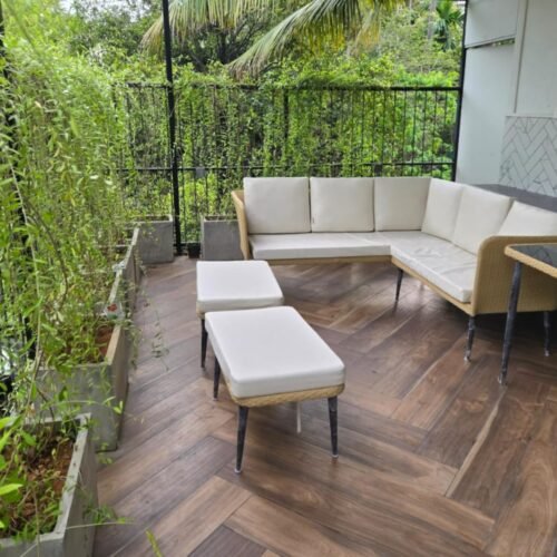 Modern rattan wicker sofa set with cushions for outdoor patio or garden seating