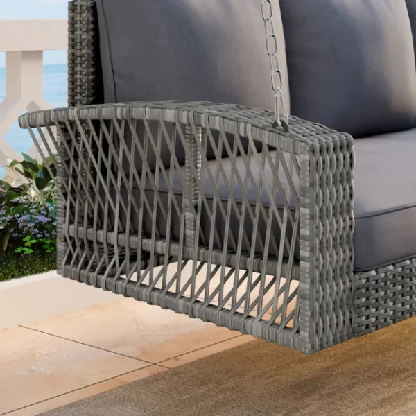 Outdoor 3-person porch swing made of durable HDPE wicker with comfortable cushions