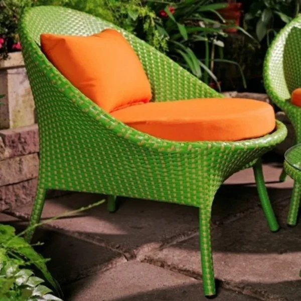 Outdoor all-weather resistant rattan wicker 5-piece dining set with table and chairs for patio or garden use.