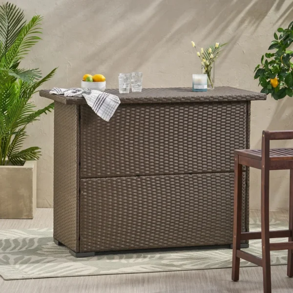 Outdoor rattan wicker bar table with built-in storage shelves for patio and backyard entertaining.