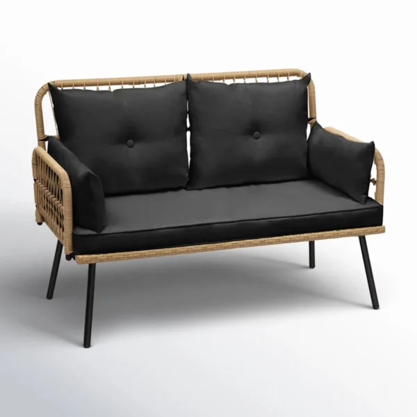 “Stylish outdoor rattan wicker loveseat sofa with soft beige cushions on a patio setup”