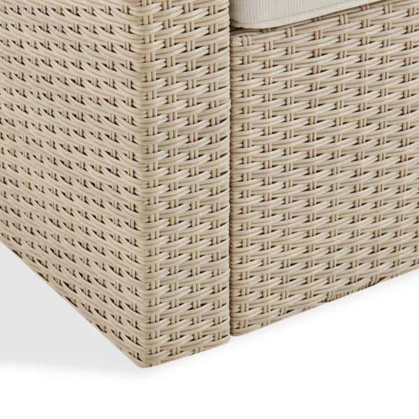 Outdoor all-weather wicker single seater sofa with comfortable cushions for patio or balcony seating.