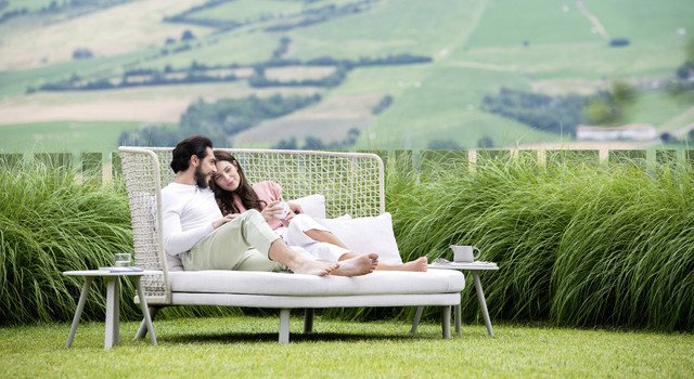 Modern luxury daybed styled with premium cushions and soft throws for an elegant 2025 home décor look