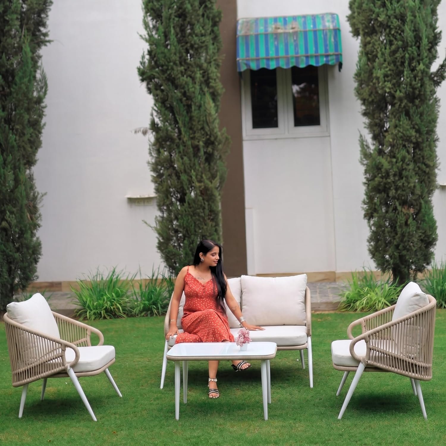 LOCCUS 4-Piece Rope Sofa Set with Beige & Off-White Waterproof Cushions, Glass Top Table, durable woven rattan frame, ideal for patio, garden, balcony, or terrace.