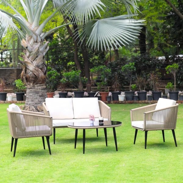 LOCCUS 4 Seater Rope Sofa Set designed for outdoor living spaces. Beige and off-white cushions complement the handwoven rope and sturdy metal frame. Includes a glass top center table, perfect for serving drinks or décor. All-weather resistant cushions make it suitable for garden, patio, poolside, or terrace.