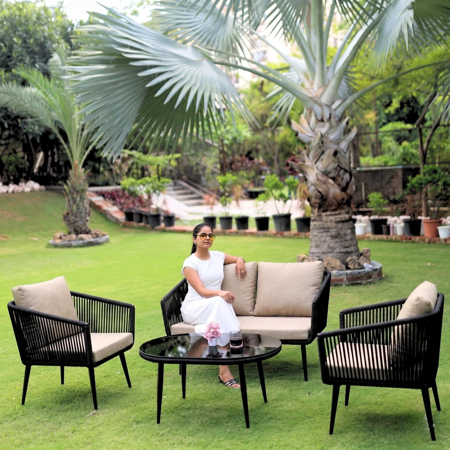 LOCCUS Outdoor Rope 4-Seater Sofa Set in black and beige with durable handwoven rope design, sturdy metal frame, and water-repellent cushions. Includes a stylish glass top table, perfect for garden, patio, pool deck, or balcony outdoor furniture.