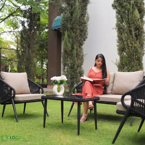 LOCCUS Outdoor Rope Sofa Set with seating for four, black and beige cushions, and a sleek glass top coffee table. Built with a strong metal frame and handwoven rope, designed for garden, patio, poolside, and balcony relaxation.