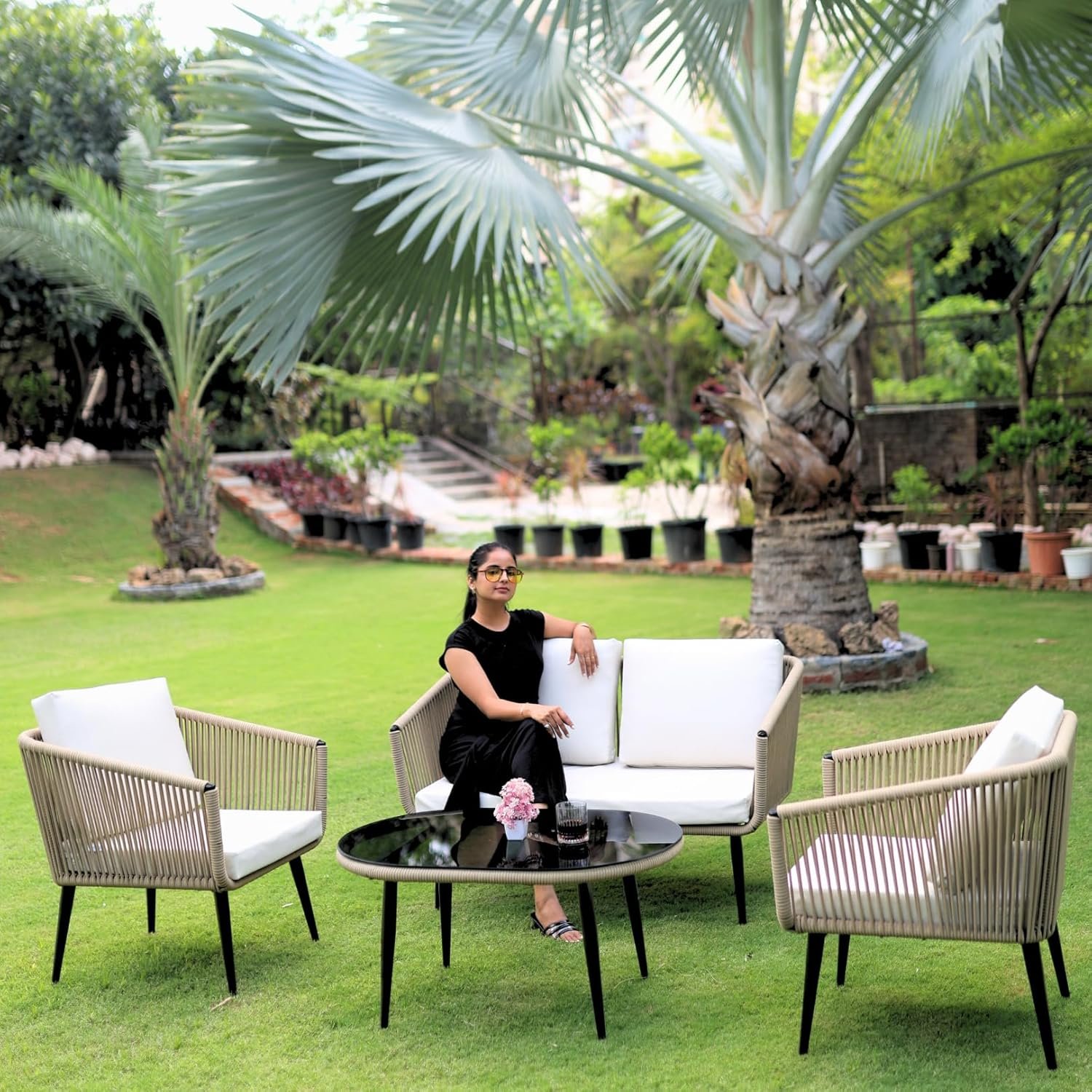 LOCCUS Outdoor 4 Seater Rope Sofa Set in beige and off-white, featuring durable handwoven rope design, sturdy metal frame, and all-weather resistant cushions. Includes a stylish glass top center table, perfect for garden, patio, poolside, or balcony use. Comfortable seating with water-repellent cushions ensures long-lasting outdoor enjoyment.