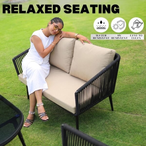 Elegant LOCCUS Rope Sofa Set with four seats, black and beige cushions, durable metal frame, and handwoven rope furniture. Includes a glass top table, perfect for outdoor relaxation in gardens, patios, poolside areas, and balconies.