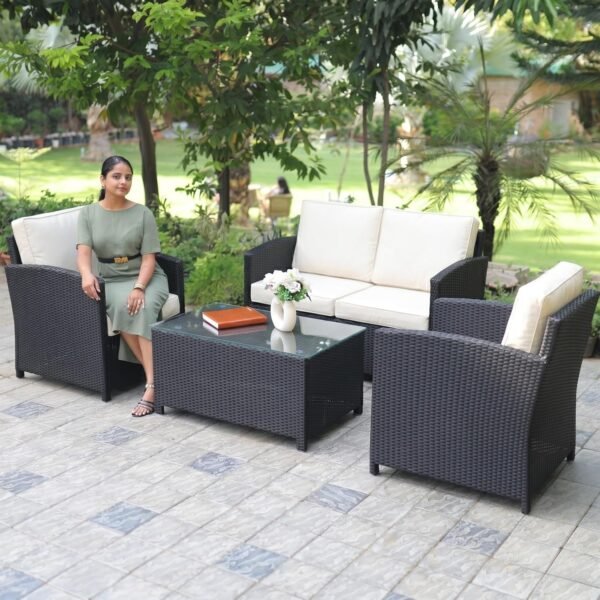 LOCCUS 4-piece outdoor wicker patio furniture set with black rattan sofa, cushioned chairs, and center coffee table. Includes off-white weather-resistant cushions for comfort. Perfect for backyard, garden, or balcony use, this durable set blends modern style with functionality for outdoor relaxation and entertaining.